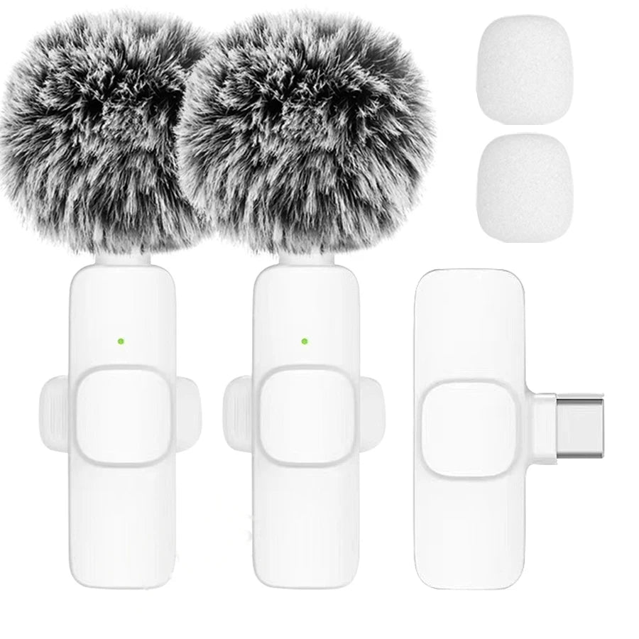 Microphone windscreen with fur and two white capsules on a white background
